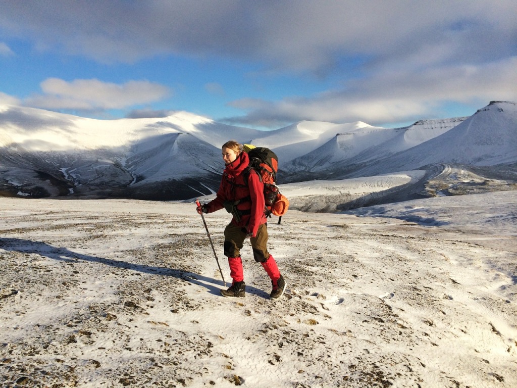 Hiking on frozen ground over Fuglefjella